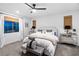 Stylish main bedroom with a comfortable bed, modern furnishings, and scenic view, providing a luxurious escape at 2710 Marchetti Pl, Henderson, NV 89044