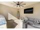 Outdoor patio with mounted TV, comfortable seating, and a grill area, perfect for entertaining at 2710 Marchetti Pl, Henderson, NV 89044