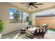 Inviting covered patio with contemporary furnishings, providing a serene outdoor retreat with scenic views at 2710 Marchetti Pl, Henderson, NV 89044