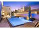 Relaxing pool and spa with waterfall feature, perfect for unwinding after a long day at 2710 Marchetti Pl, Henderson, NV 89044