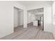 Open-concept living area with wood-look floors and plenty of natural light at 2739 Avril Point St, Las Vegas, NV 89156