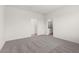 A neutral bedroom that leads to an ensuite bathroom and closet at 2739 Avril Point St, Las Vegas, NV 89156