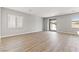 Spacious living room with hardwood floors and sliding glass doors to the backyard at 3240 Lahontan St, North Las Vegas, NV 89032