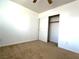 Bedroom featuring neutral carpet and a closet at 3311 Fico Ave, Las Vegas, NV 89141