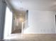 Spacious living area featuring stairway, tile flooring, and lots of natural light at 3311 Fico Ave, Las Vegas, NV 89141