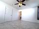 Open living room featuring tile floors and ceiling fan at 3311 Fico Ave, Las Vegas, NV 89141