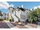Well-maintained condo exterior with steps leading to the upper units and landscaped surroundings at 3425 E Russell Rd # 202, Las Vegas, NV 89120