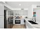 Stylish kitchen featuring stainless steel appliances, granite countertops, and a functional layout at 3425 E Russell Rd # 202, Las Vegas, NV 89120