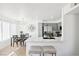 Well-lit kitchen connected to a dining area, featuring stainless steel appliances and granite countertops at 3425 E Russell Rd # 202, Las Vegas, NV 89120