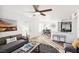 Inviting living room showcasing a modern kitchen with stainless appliances and an adjacent dining area at 3425 E Russell Rd # 202, Las Vegas, NV 89120