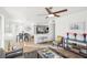 Open-concept living room featuring hardwood floors and neutral decor, creating a cozy and inviting atmosphere at 3425 E Russell Rd # 202, Las Vegas, NV 89120