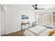 Well-lit main bedroom featuring modern decor, hardwood floors, and a large window at 3425 E Russell Rd # 202, Las Vegas, NV 89120