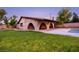 Charming pool house featuring brick arches and a terracotta roof, adjacent to a refreshing swimming pool at 3455 Five Pennies Ln, Las Vegas, NV 89120