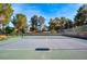 Well-maintained tennis court with professional surfacing, lighting, and perimeter fencing at 3455 Five Pennies Ln, Las Vegas, NV 89120