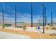 Community baseball field with backstops, dugouts and netting in a public park setting at 3514 Punta Tersiva Ln, Henderson, NV 89044