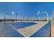 Community basketball court with multiple hoops and well-maintained surface at 3514 Punta Tersiva Ln, Henderson, NV 89044