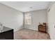 Clean bedroom with carpet, window, and closet with desk and dresser at 3514 Punta Tersiva Ln, Henderson, NV 89044