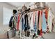 Organized walk-in closet with shelves, rods, shoes and storage space at 3514 Punta Tersiva Ln, Henderson, NV 89044