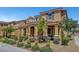 Inviting exterior showcasing a well-maintained front yard, covered entry, and appealing architecture at 3514 Punta Tersiva Ln, Henderson, NV 89044