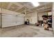 Spacious two car garage with storage, tool, and water heater at 3514 Punta Tersiva Ln, Henderson, NV 89044