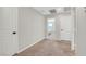 Neutral-toned upstairs hallway offers seamless transitions to various rooms at 3514 Punta Tersiva Ln, Henderson, NV 89044