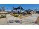 Community playground featuring covered picnic pavilion and sun shades over playground equipment on a sunny day at 3514 Punta Tersiva Ln, Henderson, NV 89044