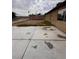 Spacious concrete backyard with a fenced perimeter at 3933 Lighthouse Ave, Las Vegas, NV 89110