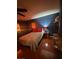 Bedroom with neutral bedding and flooring, showcasing space and comfort at 3933 Lighthouse Ave, Las Vegas, NV 89110