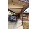 Carport with a vehicle parked underneath with view of the house at 3933 Lighthouse Ave, Las Vegas, NV 89110