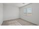 Bedroom showcasing new carpet, fresh paint, and a bright, natural light at 4219 Gold Desert St, North Las Vegas, NV 89032