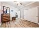 Spacious bedroom featuring a sliding-door closet and wood-look flooring at 4317 Via Vinci Ct, Pahrump, NV 89061