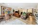 Spacious living room with hardwood floors, comfortable seating, and stylish decor at 4317 Via Vinci Ct, Pahrump, NV 89061