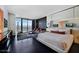 Modern bedroom featuring city views, sleek furniture and a luxurious king size bed at 4381 W Flamingo Rd # 27309, Las Vegas, NV 89103