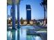 Beautiful pool area with clear water and comfortable seating in an outdoor resort setting at 4381 W Flamingo Rd # 27309, Las Vegas, NV 89103