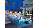 Stunning pool area featuring in-water seating and modern design, ideal for relaxation in a luxurious setting at 4381 W Flamingo Rd # 27309, Las Vegas, NV 89103