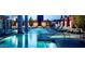 Serene pool area with stepping stones and comfortable lounge chairs, perfect for relaxation by the water at 4381 W Flamingo Rd # 27309, Las Vegas, NV 89103