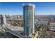High-rise Palms Place building with a clear view of the city skyline at 4381 W Flamingo Rd # 5318, Las Vegas, NV 89103