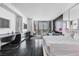 Bedroom featuring a workspace, with stunning views of the city from the large windows and balcony at 4381 W Flamingo Rd # 5318, Las Vegas, NV 89103