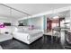 Modern bedroom featuring a king-size bed and a full kitchen with stainless steel appliances at 4381 W Flamingo Rd # 5318, Las Vegas, NV 89103