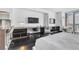 Bedroom featuring a work desk and a comfortable seating area near the balcony and a view at 4381 W Flamingo Rd # 5318, Las Vegas, NV 89103