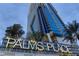 Exterior shot of the Palms Place building with prominent signage and modern architectural design at 4381 W Flamingo Rd # 5318, Las Vegas, NV 89103