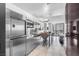 Modern kitchen featuring stainless steel appliances and a breakfast bar with seating, offering views at 4381 W Flamingo Rd # 5318, Las Vegas, NV 89103