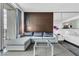 Stylish living room with a balcony view, modern sofa, and elegant wood paneling at 4381 W Flamingo Rd # 5318, Las Vegas, NV 89103