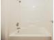 Bathroom featuring a shower and tub, light walls, and classic chrome fixtures at 4412 Red Blanket Rd, North Las Vegas, NV 89032