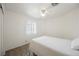 Bright bedroom featuring light walls, ceiling fan, window, and wood-look flooring at 4412 Red Blanket Rd, North Las Vegas, NV 89032