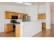Bright kitchen with stainless steel appliances and wooden cabinets at 4412 Red Blanket Rd, North Las Vegas, NV 89032