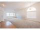 Bright living room featuring plush carpet and lots of natural light at 4412 Red Blanket Rd, North Las Vegas, NV 89032