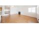 Open layout with hardwood floors, living area with fireplace, and lots of windows at 4412 Red Blanket Rd, North Las Vegas, NV 89032