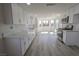 Beautiful kitchen featuring stainless steel appliances, white cabinetry, and tile floors at 4416 Inez Dr, Las Vegas, NV 89130