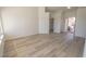 Spacious living room with light flooring and plenty of space for entertaining at 4416 Inez Dr, Las Vegas, NV 89130